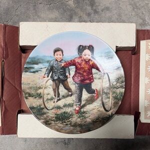 Rolling Hoops by Kee Fung Ng